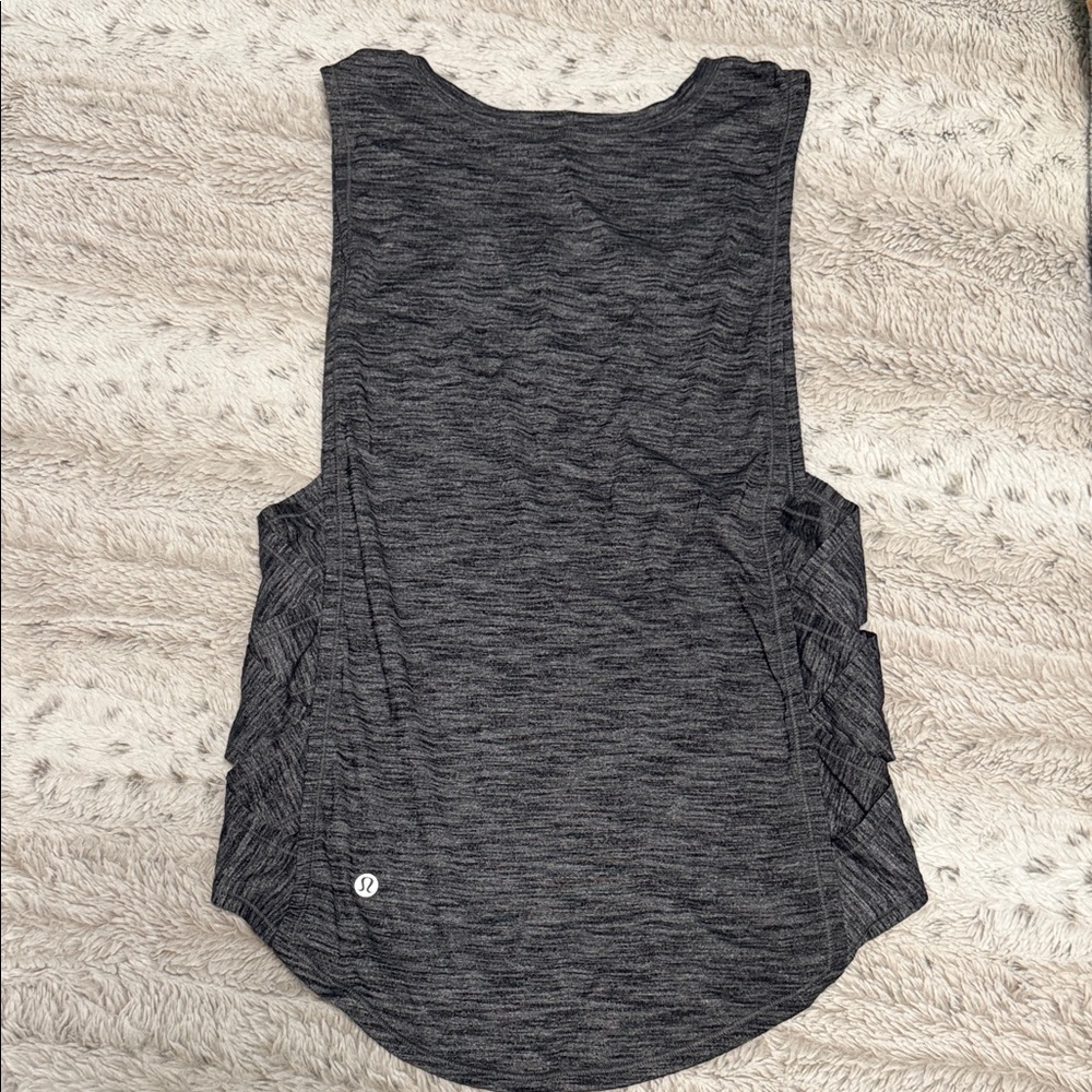 Lululemon Women's Gray Sleeveless Top with crisscross sides. Size 4